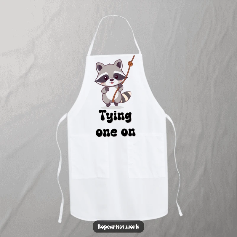 Funny Kawaii Raccoon Apron showing a cute raccoon swinging, ideal for kitchen use and adding humor to cooking sessions.