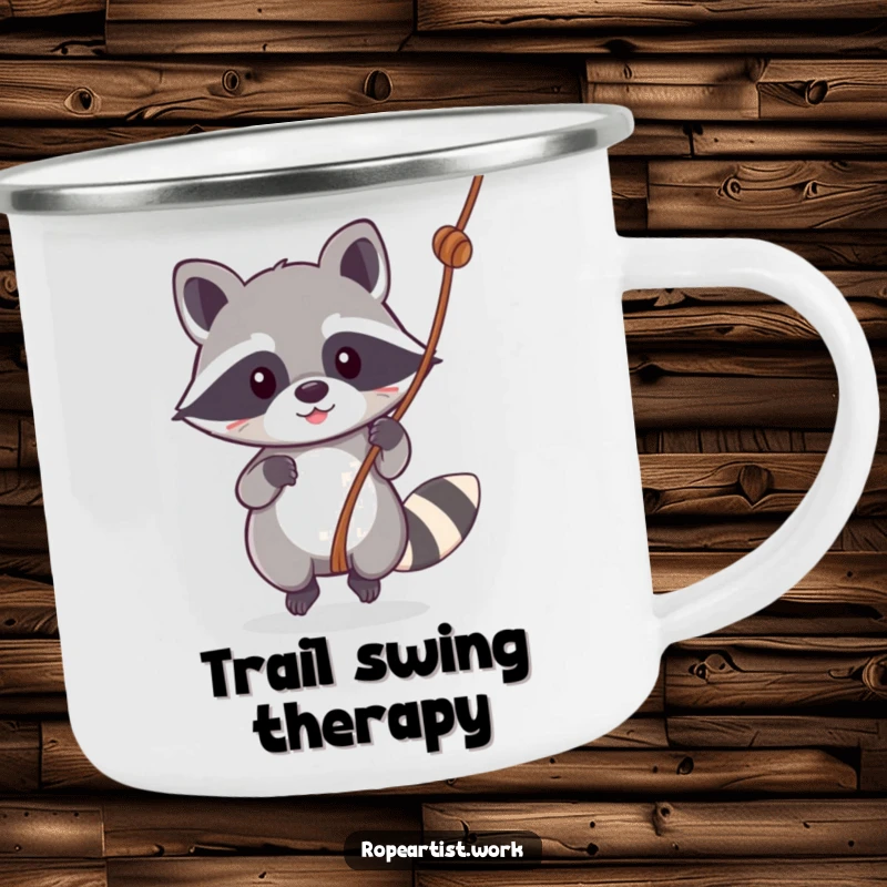 Funny Kawaii Raccoon Camping Mug showing a cute raccoon swinging, designed for outdoor enthusiasts and adding humor to camping trips.